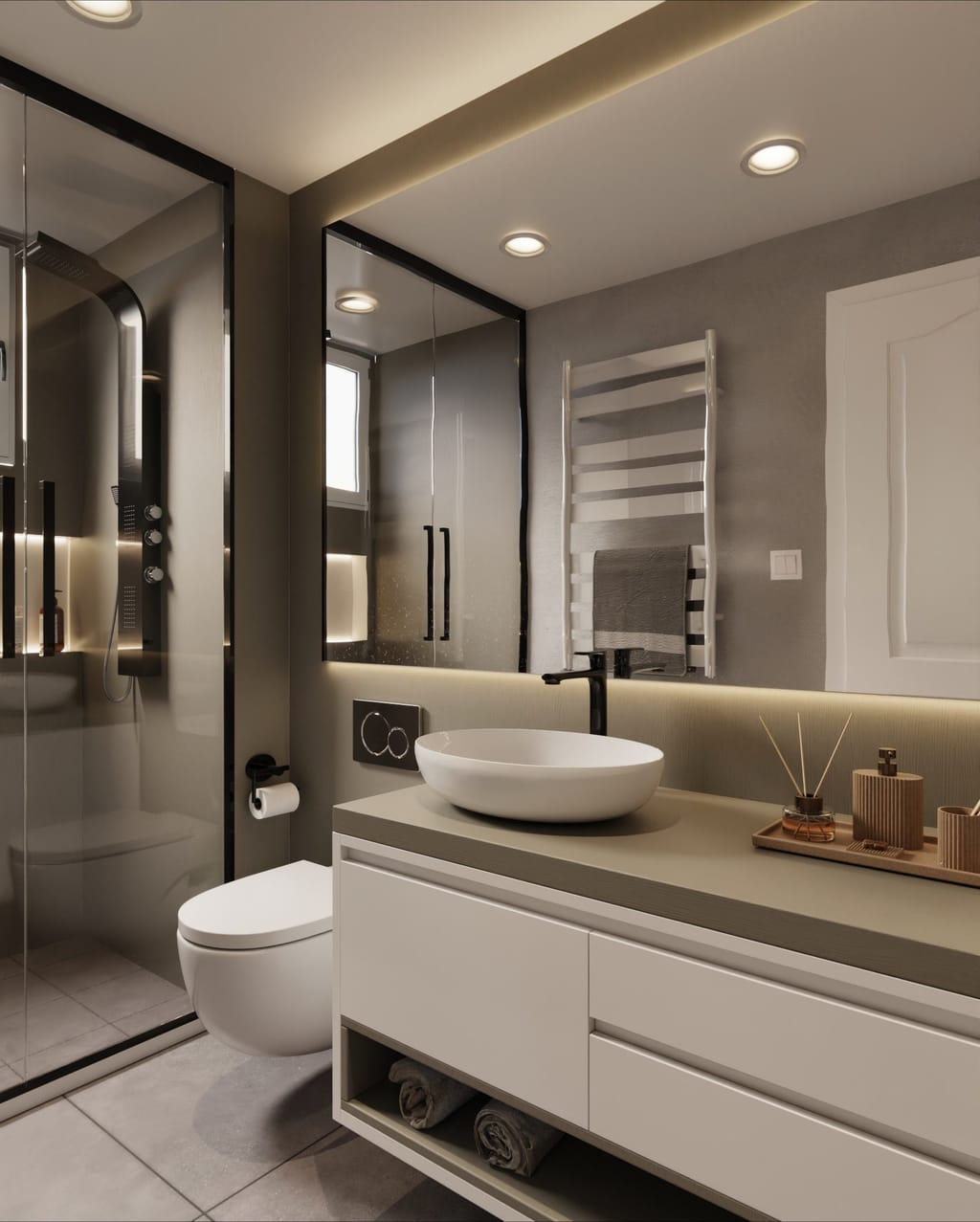 Salle de bain aux murs et plan vasque gris taupe, meuble blanc, vasque à poser et douche vitrée
